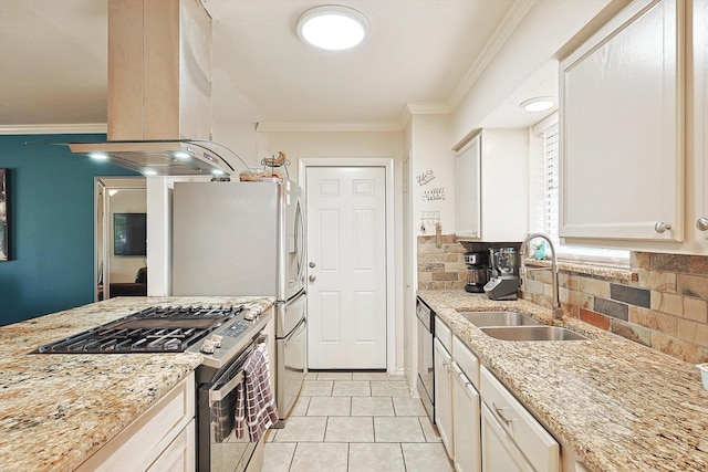 kitchen with sink, stainless steel range with gas cooktop, light stone counters, backsplash, and island exhaust hood