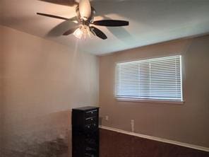 unfurnished room featuring ceiling fan