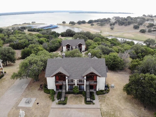 bird's eye view with a water view