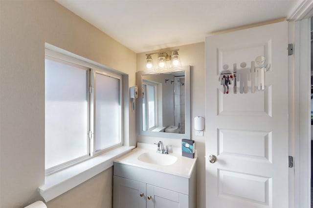 bathroom with vanity and walk in shower