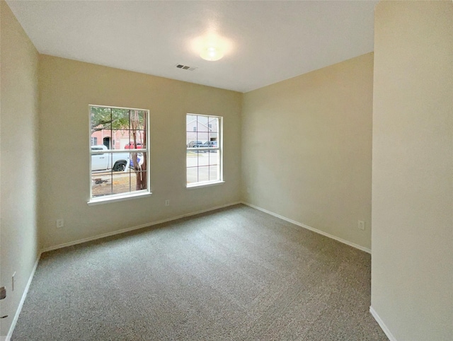 empty room featuring carpet