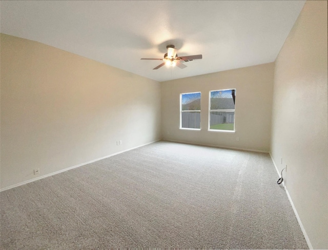 unfurnished room with light carpet and ceiling fan