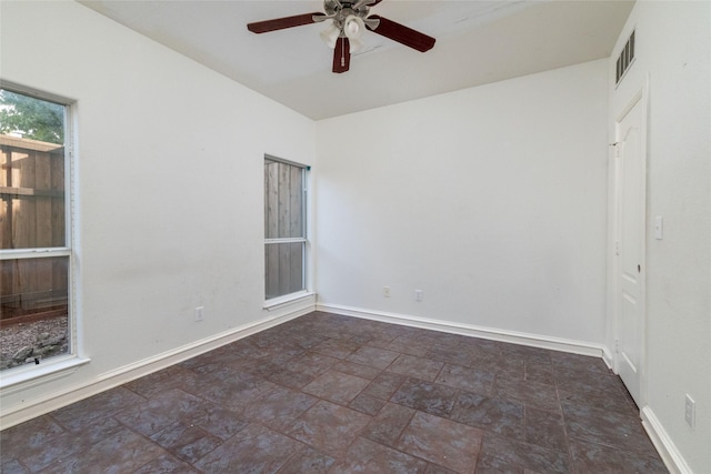 empty room featuring ceiling fan