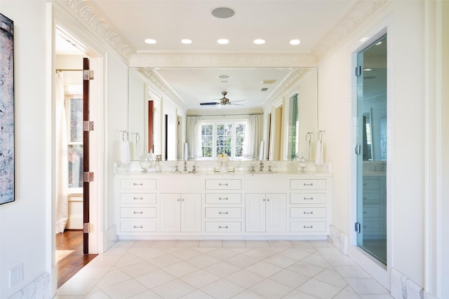 bathroom with vanity, crown molding, ceiling fan, an enclosed shower, and wood-type flooring