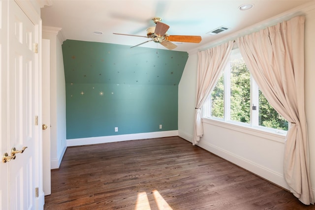 additional living space featuring ceiling fan, dark wood-type flooring, and vaulted ceiling