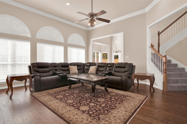 living room featuring crown molding, ceiling fan, and dark hardwood / wood-style flooring