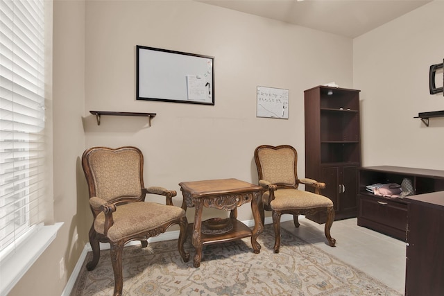 living area with light tile patterned floors