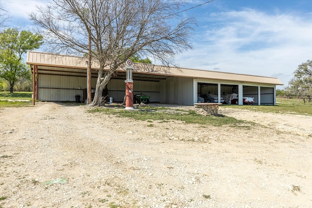 view of front facade with an outbuilding