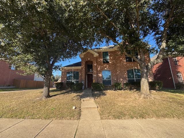 view of front of house with a front yard