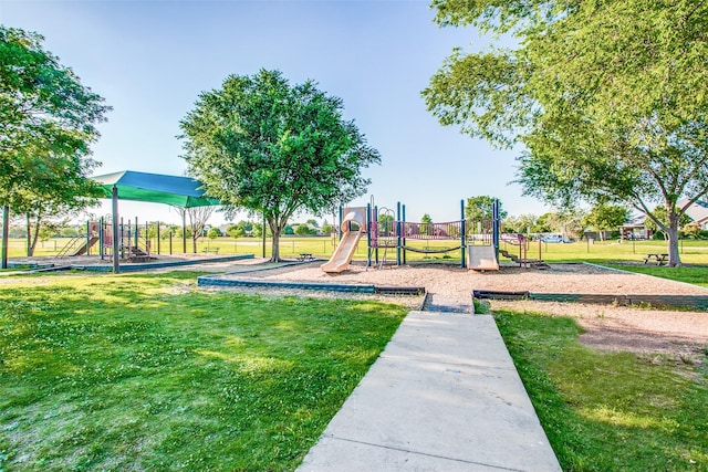 view of play area featuring a lawn