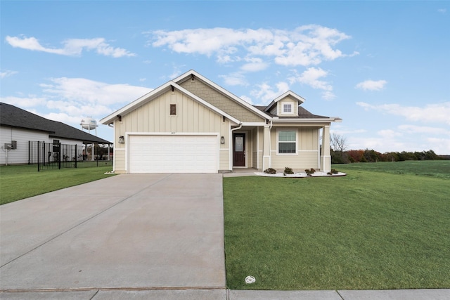 view of front facade featuring a garage and a front yard