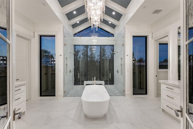 bathroom with beamed ceiling, vanity, shower with separate bathtub, and a chandelier