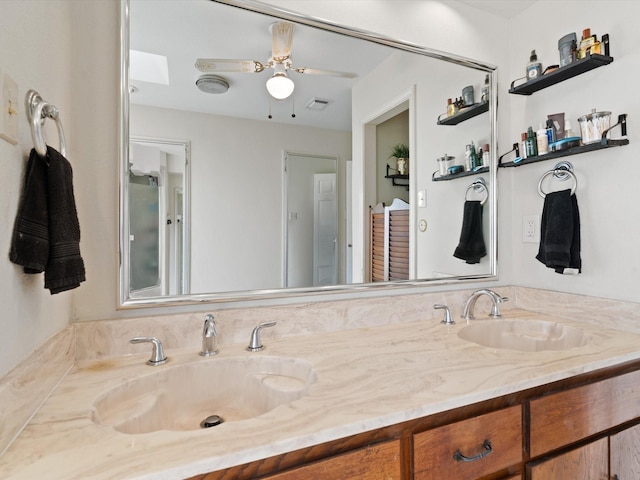 bathroom featuring vanity and ceiling fan