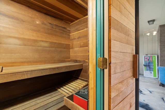 view of sauna featuring concrete flooring