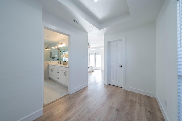 hallway featuring light hardwood / wood-style floors