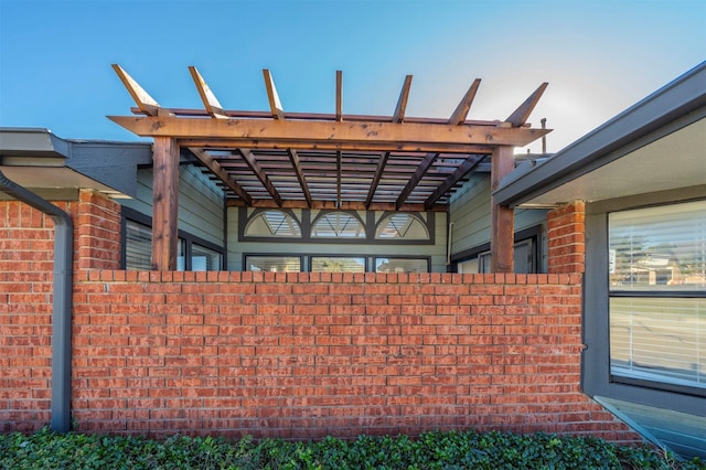 exterior space featuring a pergola