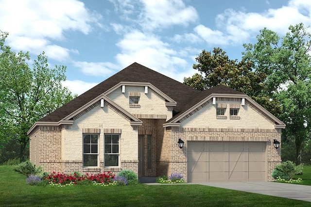 view of front of home featuring a garage and a front lawn