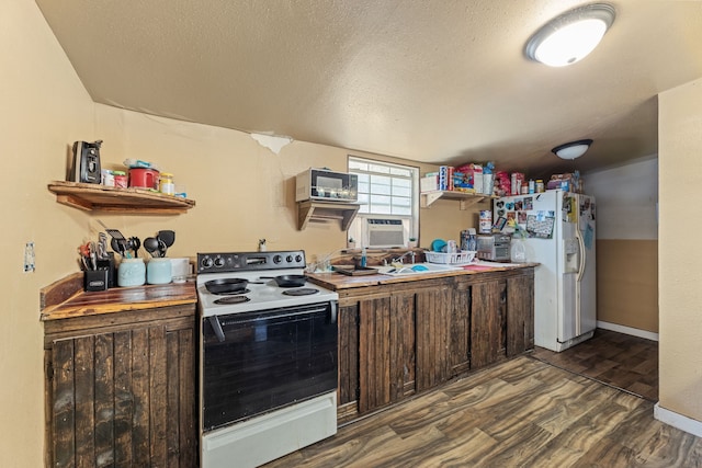 kitchen with sink, dark hardwood / wood-style flooring, a textured ceiling, white appliances, and dark brown cabinets