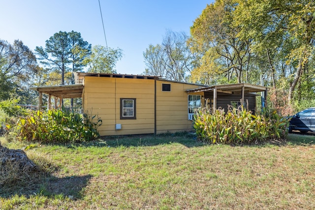 view of property exterior featuring a yard