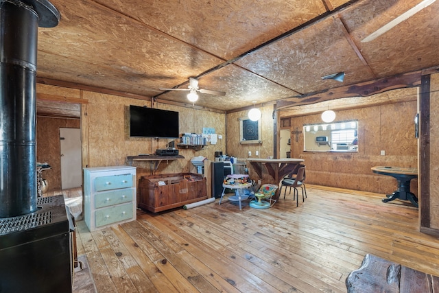 misc room featuring hardwood / wood-style flooring and ceiling fan