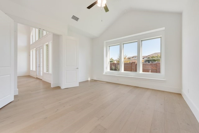 unfurnished living room featuring light hardwood / wood-style flooring, high vaulted ceiling, and ceiling fan