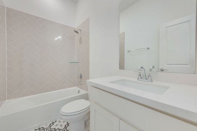 full bathroom featuring tiled shower / bath combo, vanity, and toilet