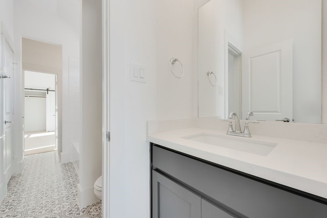 full bathroom featuring vanity,  shower combination, and toilet