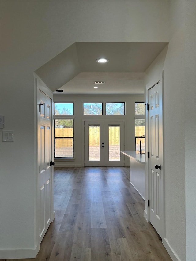 doorway featuring hardwood / wood-style floors and french doors