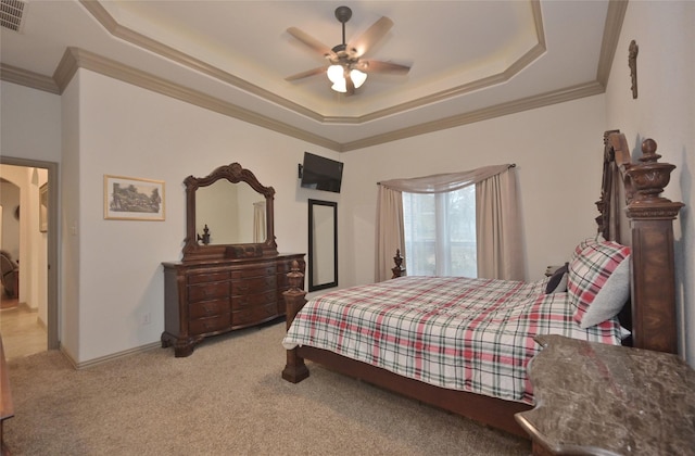 bedroom with light carpet, a raised ceiling, ceiling fan, and crown molding