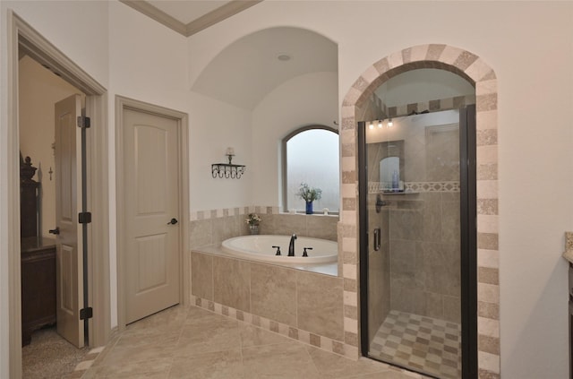 bathroom with separate shower and tub, crown molding, and tile patterned floors