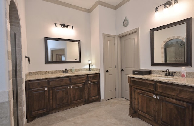 bathroom with tile patterned flooring, vanity, and crown molding