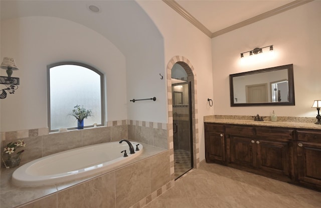 bathroom with ornamental molding, vanity, vaulted ceiling, tile patterned flooring, and shower with separate bathtub