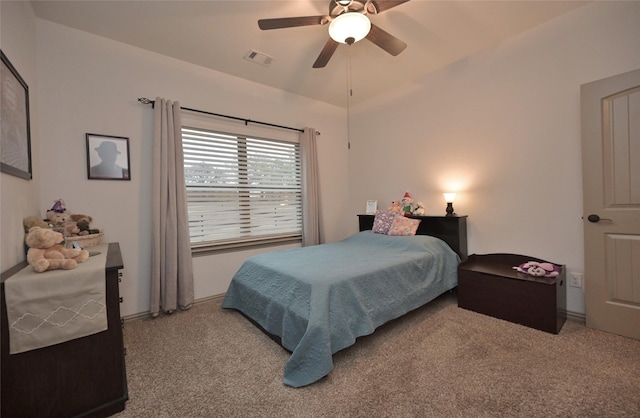 bedroom with ceiling fan and carpet floors