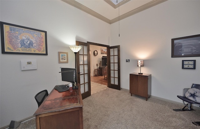 office area with light carpet, french doors, and ornamental molding