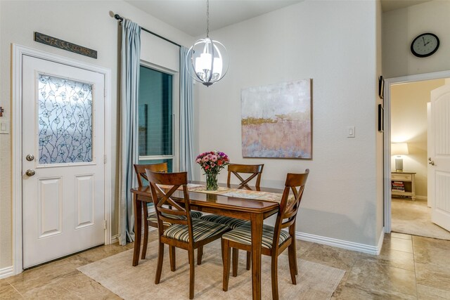 3308 Estacado Dr, Denton, TX 76210 - dining space with light tile patterned floors, baseboards, and a notable chandelier