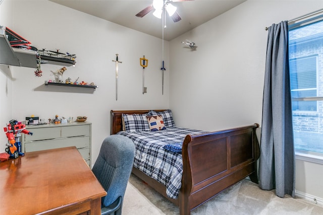 3308 Estacado Dr, Denton, TX 76210 - bedroom with light colored carpet, baseboards, and a ceiling fan