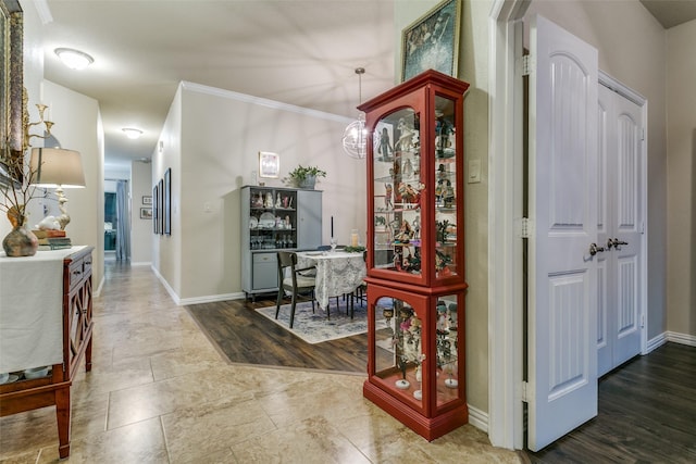 3308 Estacado Dr, Denton, TX 76210 - hall with baseboards, ornamental molding, and a notable chandelier
