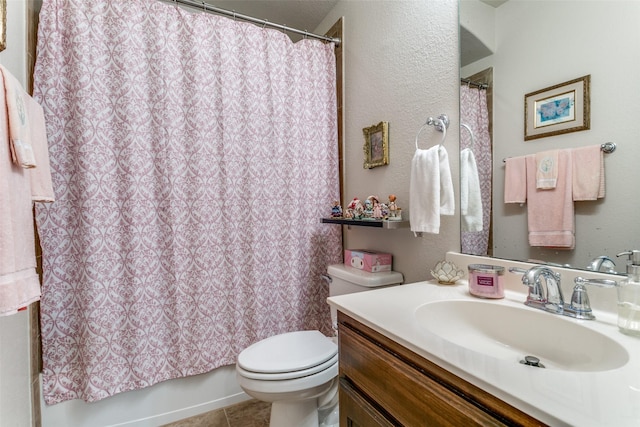 3308 Estacado Dr, Denton, TX 76210 - bathroom featuring tile patterned floors, toilet, shower / tub combo, and vanity