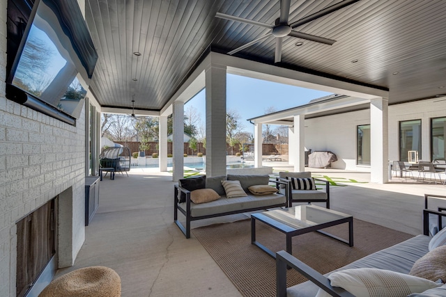 view of patio / terrace with outdoor lounge area and ceiling fan