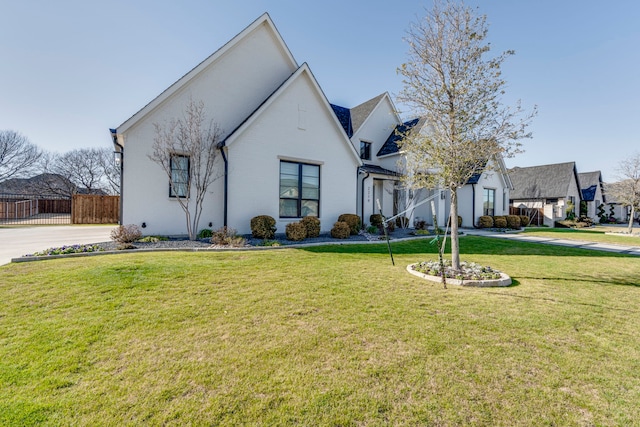 view of front of property with a front lawn