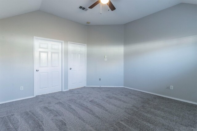 unfurnished bedroom featuring lofted ceiling, carpet floors, and ceiling fan