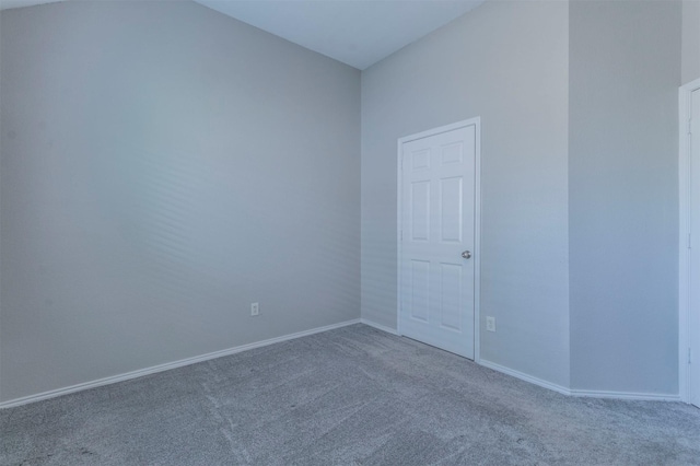 unfurnished room with carpet flooring