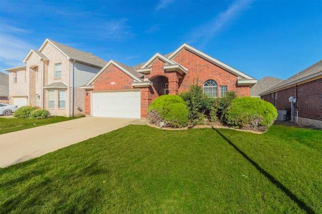 view of front of home featuring central AC unit, a garage, and a front yard