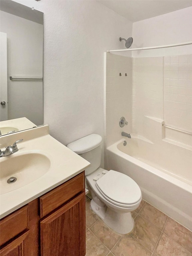 full bathroom featuring shower / tub combination, tile patterned flooring, vanity, and toilet