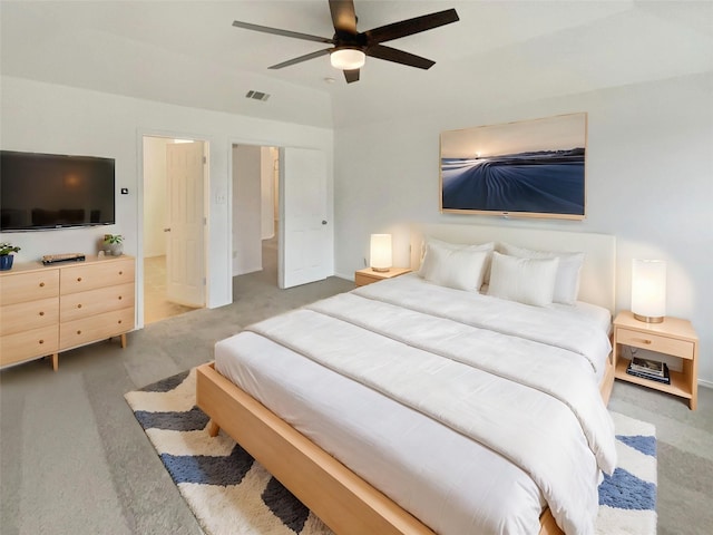 bedroom featuring ceiling fan and carpet