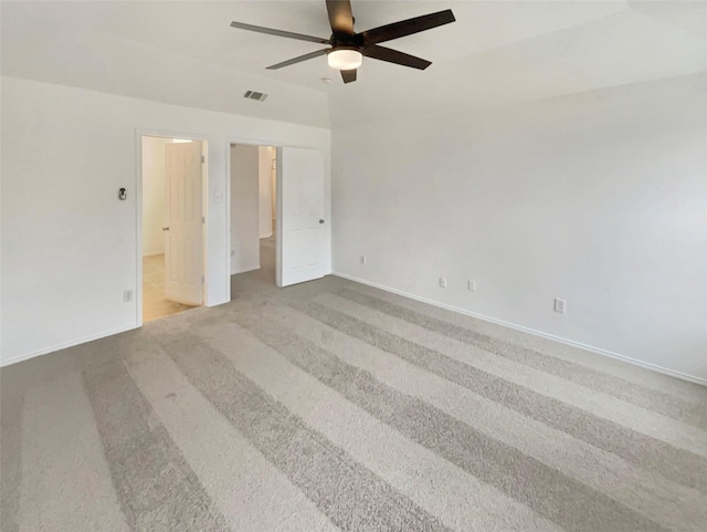 carpeted empty room with ceiling fan