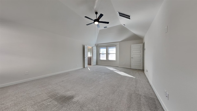 carpeted empty room featuring high vaulted ceiling and ceiling fan