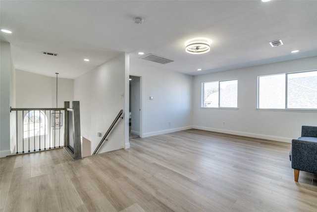 empty room with light wood-type flooring