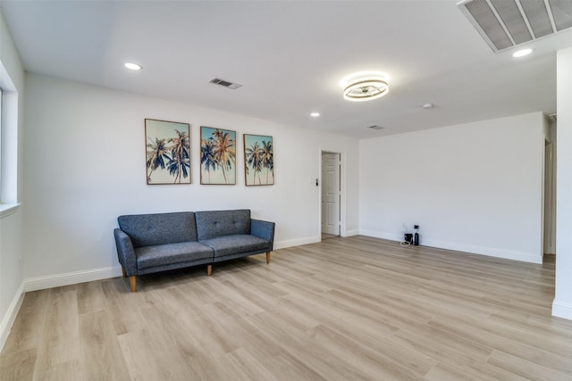 sitting room with light hardwood / wood-style floors