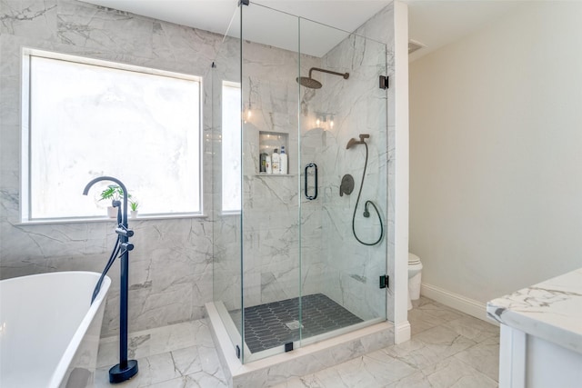 3402 Seabreeze Dr, Rowlett, TX 75088 - full bathroom with marble finish floors, a freestanding bath, a marble finish shower, and healthy amount of natural light